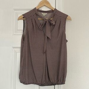 Max Studio sleeveless top with tie neck.